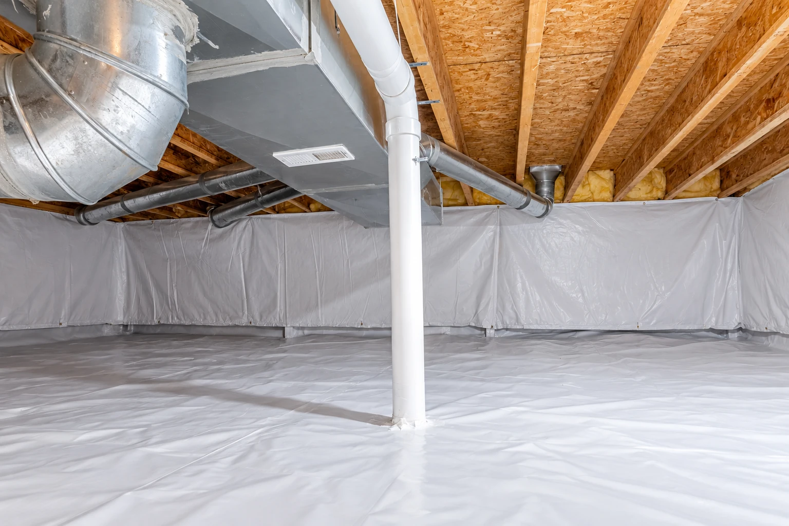 White vapor barrier covers a crawl space floor and walls beneath exposed joists, ductwork, and a central support post.
